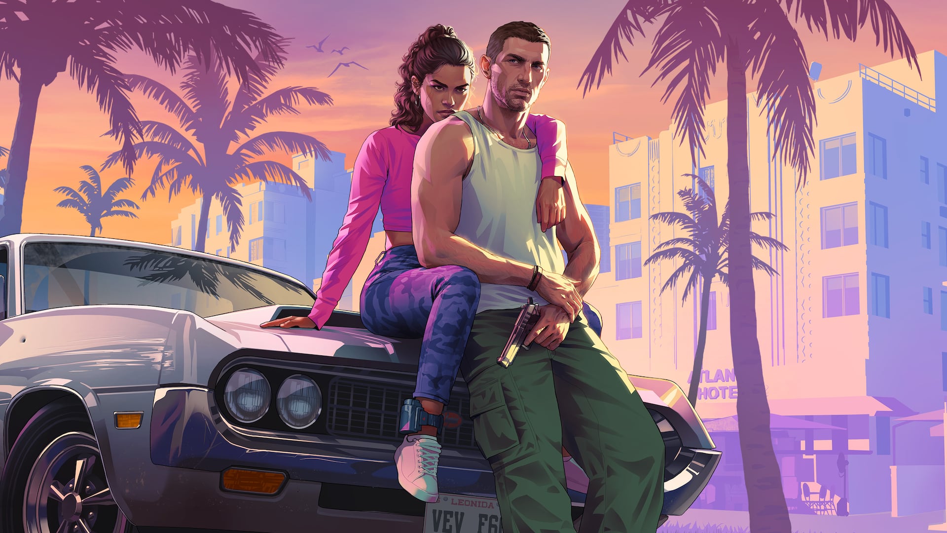 Jason and Lucia against the city at sunset